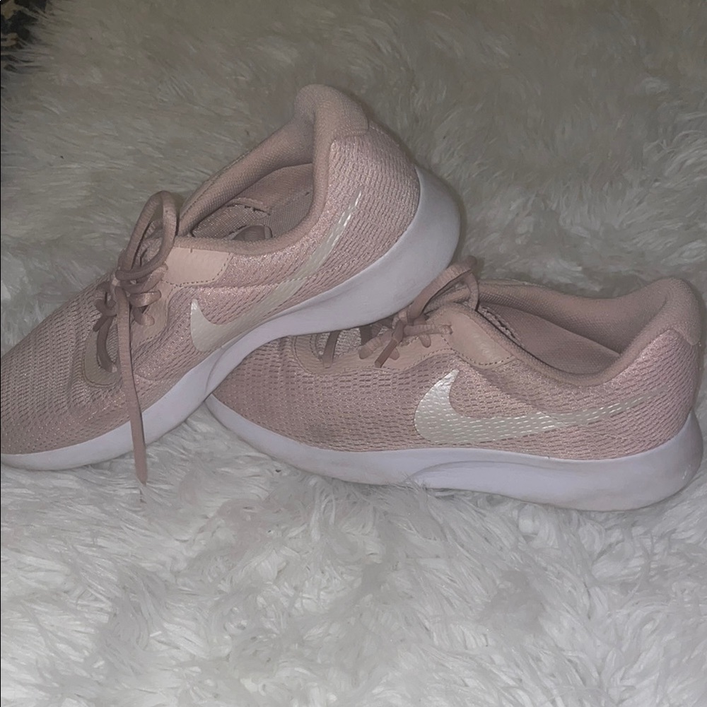 Nike Pink and White Sneakers with Minimalist Design
